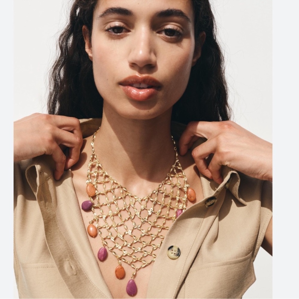 Zara Women's golden beaded bib statement necklace with orange and purple beads.